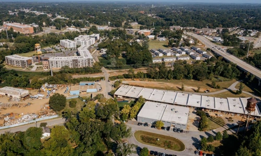 Aerial view of a large commercial and industrial development site where surveying companies support site planning